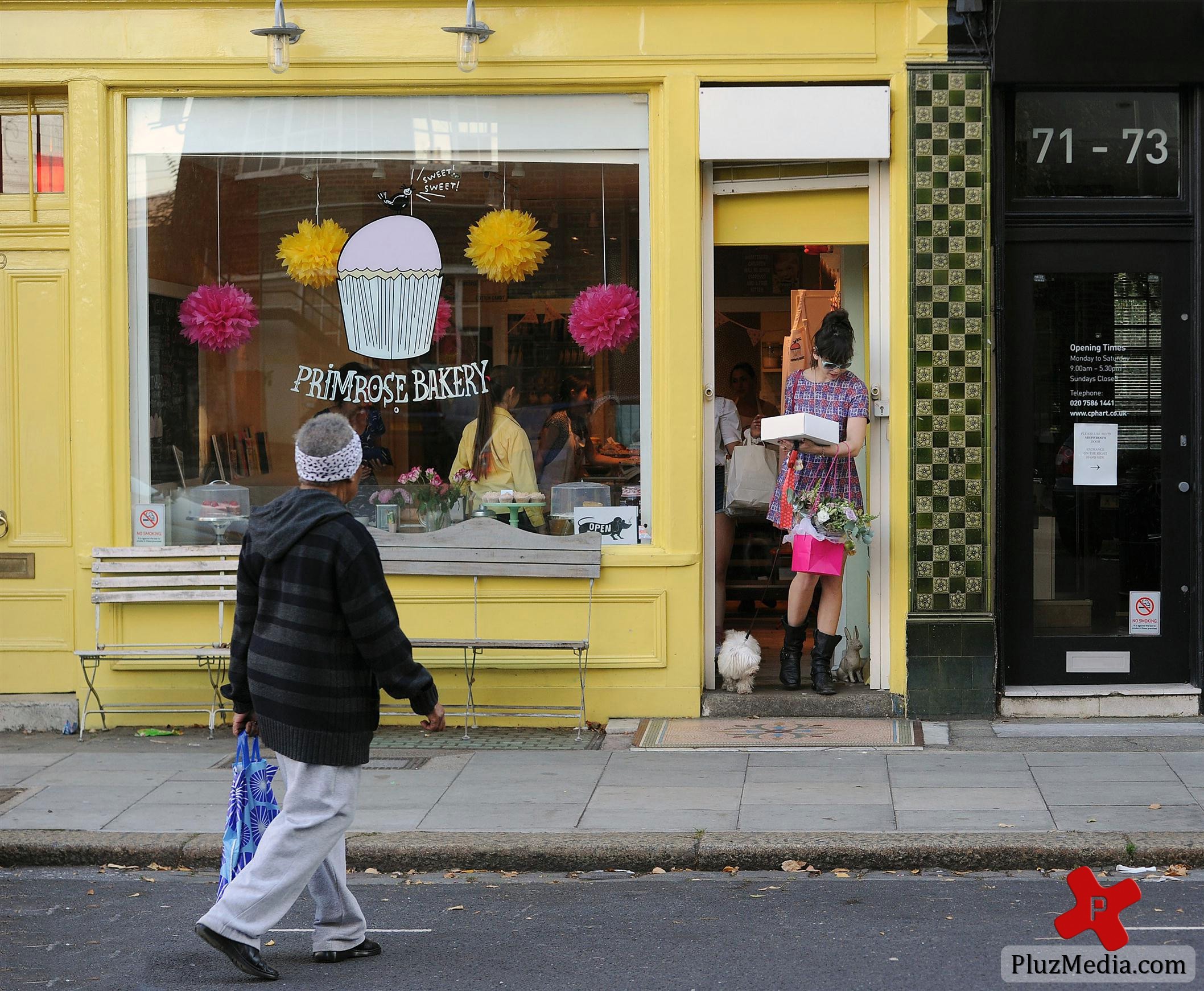 Daisy Lowe and a female companion walking her pet dog | Picture 89020